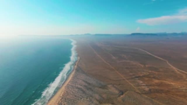 LA BOCANA BCS MEXICO-2022: Desert Coastline with Ocean Waves and Arid Terrain