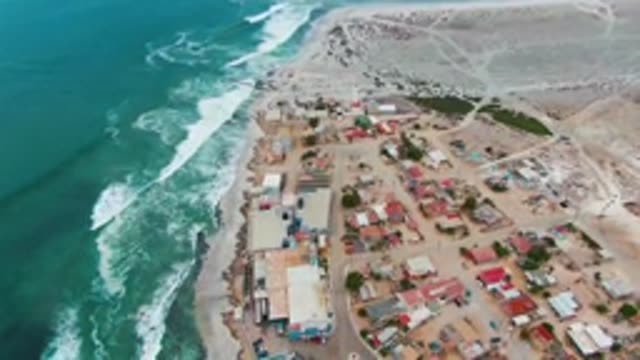 PUENTA ABREOJOS BCS MEXICO-2022: Coastal Settlement with Ocean Waves and Sandy Shore