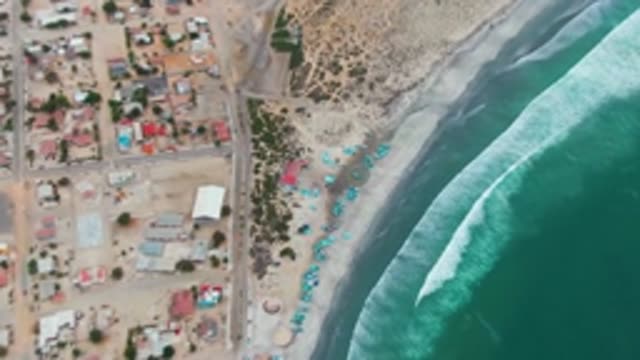 PUENTA ABREOJOS BCS MEXICO-2022: Coastal Settlement and Sandy Beach with Turquoise Waves