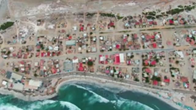 PUENTA ABREOJOS BCS MEXICO-2022: Coastal Settlement with Ocean Waves and Houses