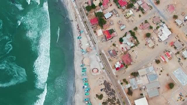 PUENTA ABREOJOS BCS MEXICO-2022: Waves Rolling Along Beach and Coastal Homes