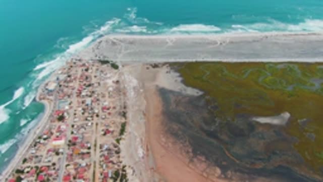PUENTA ABREOJOS BCS MEXICO-2022: Coastal Town with Sandy Beach and Ocean Waves