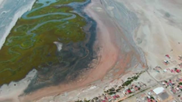 PUENTA ABREOJOS BCS MEXICO-2022: Aerial Lagoon with Colorful Water and Emission Plume