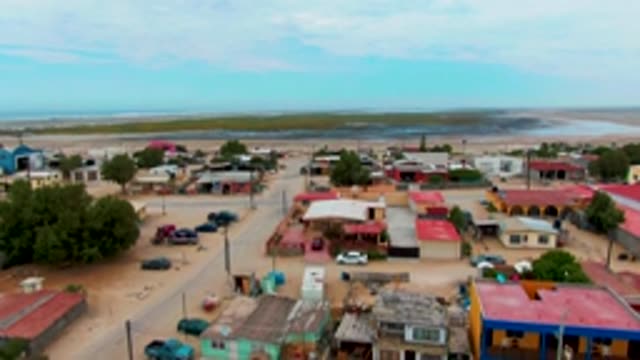 PUENTA ABREOJOS BCS MEXICO-2022: Coastal Settlement with Moving Vehicles and Pedestrian
