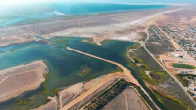 GUERRERO NEGRO BCS MEXICO-2022: Dissipating Smoke over Water and Dry Terrain
