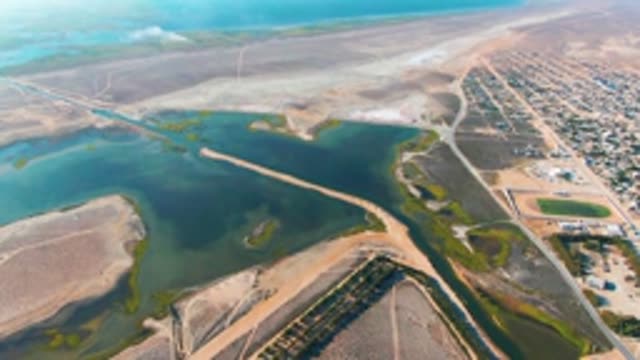 GUERRERO NEGRO BCS MEXICO-2022: Moving Shadow Across Inland Waterway