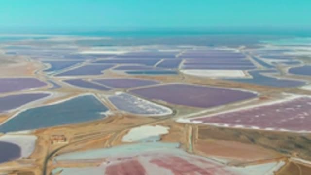 GUERRERO NEGRO BCS MEXICO-2022: Colorful Salt Evaporation Ponds with Moving Clouds