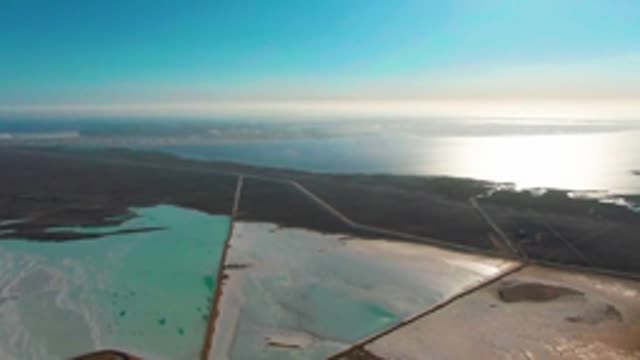 GUERRERO NEGRO BCS MEXICO-2022: Salt Ponds with Turquoise Water and Dark Terrain