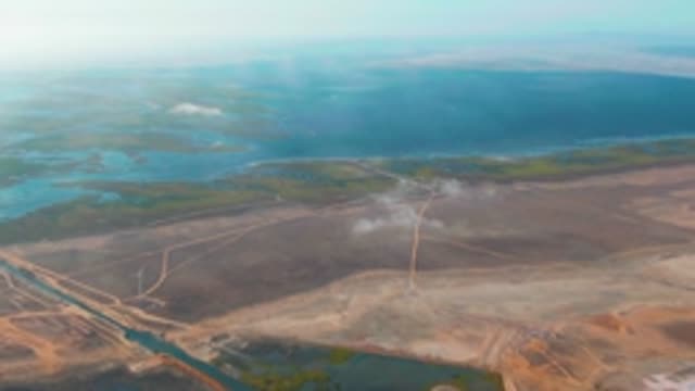 GUERRERO NEGRO BCS MEXICO-2022: White Plume Drifting over Wetland and Dry Terrain