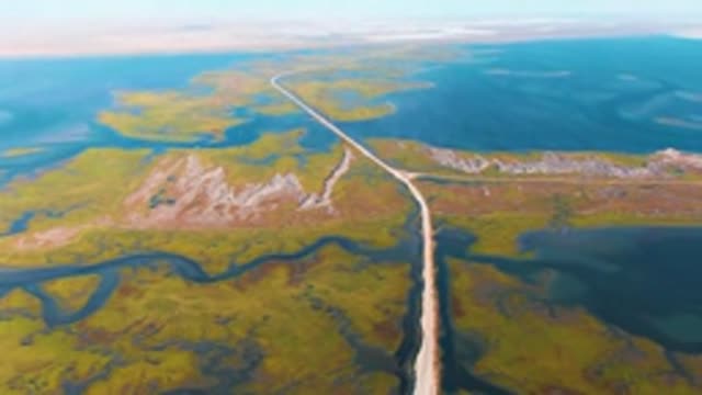GUERRERO NEGRO BCS MEXICO-2022: Road Through Tundra Wetlands with Winding Waterways