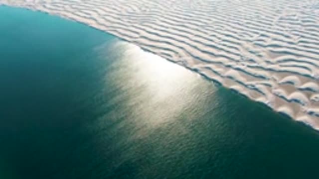 GUERRERO NEGRO BCS MEXICO-2022: White Sand Dunes Bordering Calm Ocean Waters