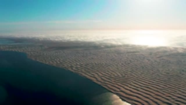GUERRERO NEGRO BCS MEXICO-2022: Rippled Sand Dunes and Ocean at Sunrise