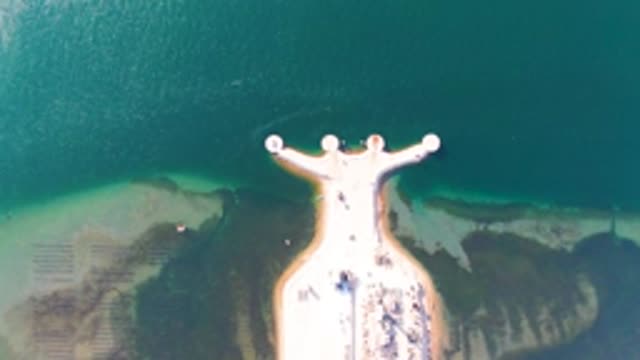 GUERRERO NEGRO BCS MEXICO-2022: People Moving on T-Shape Pier Over Clear Water