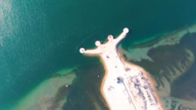 GUERRERO NEGRO BCS MEXICO-2022: Pier Extending Into Clear Turquoise Water
