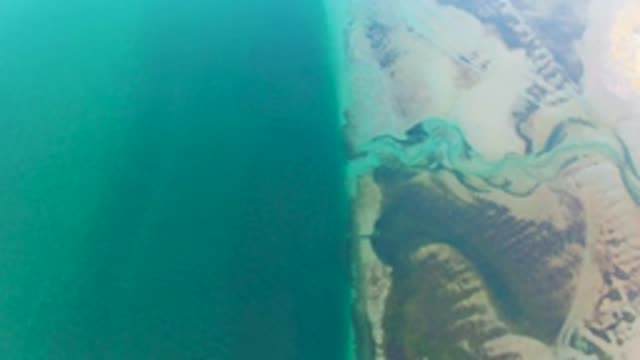 GUERRERO NEGRO BCS MEXICO-2022: Winding River Merging with Ocean