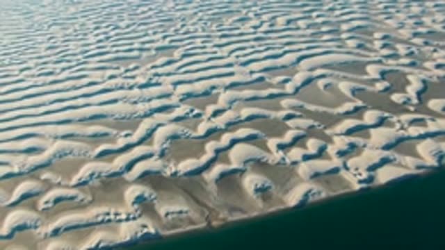 GUERRERO NEGRO BCS MEXICO-2022: White Sand Dunes Forming Wave-like Patterns by the Ocean