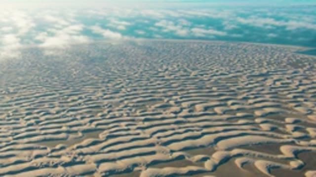 GUERRERO NEGRO BCS MEXICO-2022: Wavy Sand Dunes Under Cloudy Sky