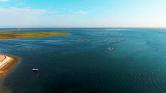 GUERRERO NEGRO BCS MEXICO-2022: Small Boats Navigating Calm Coastal Waters