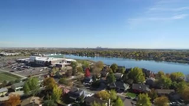 HIDDEN LAKE COLORADO-2016: Vertical Drone Shot Of School And Parking Lot And