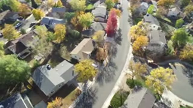 HIDDEN LAKE COLORADO-2016: An Aerial View Of A Neighborhood With A Lot Of Trees