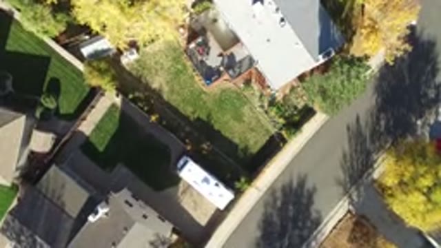 HIDDEN LAKE COLORADO-2016: Plane Flying Above City Houses And Nature