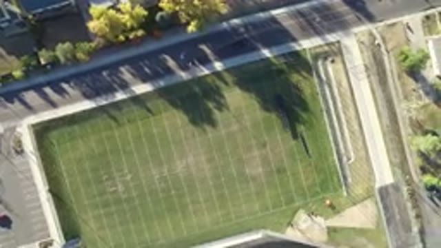 HIDDEN LAKE COLORADO-2016: Aerial View Over An Empty Grassy Sports Field
