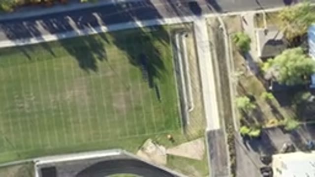 HIDDEN LAKE COLORADO-2016: An Aerial View Of A Large Green Field That Is Next To