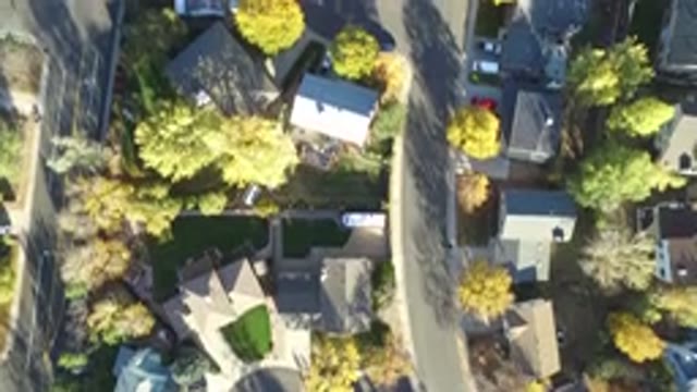 HIDDEN LAKE COLORADO-2016: A Beautiful View Of A Neighborhood With Green Grass
