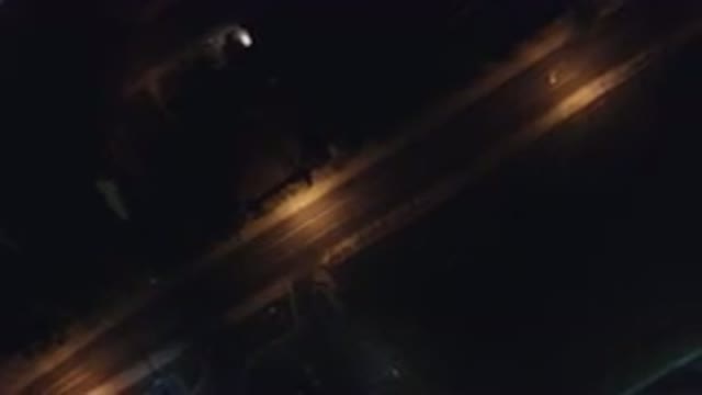 HIDDEN LAKE COLORADO-2016: Aerial View Of An Empty Street With Lights During The Night