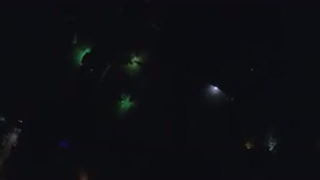HIDDEN LAKE COLORADO-2016: Aerial View Of A City In The Dark With Some Lights On