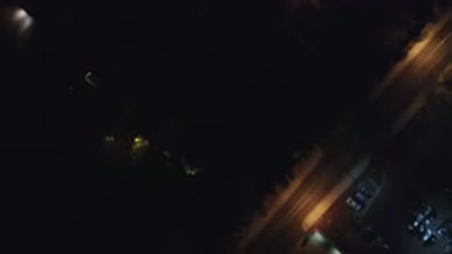 HIDDEN LAKE COLORADO-2016: A Dark Street With Street Lamps Lit