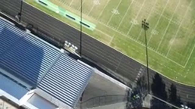 HIDDEN LAKE COLORADO-2016: Aerial Footage Of A Football Field With A Surrounding
