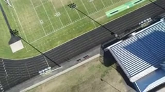 HIDDEN LAKE COLORADO-2016: Aerial View of Football Field With Empty Bleachers