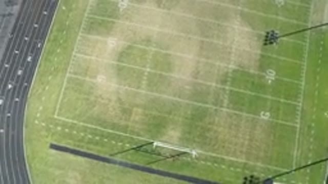 HIDDEN LAKE COLORADO-2016: Aerial View Of An Open Green Football Field