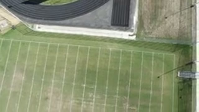 HIDDEN LAKE COLORADO-2016: Aerial View Of An Empty Football Field Next To A