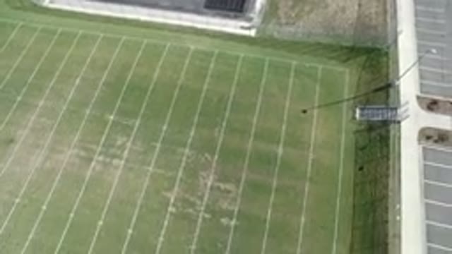 HIDDEN LAKE COLORADO-2016: Football Field With Poor Shaped Grass And Without