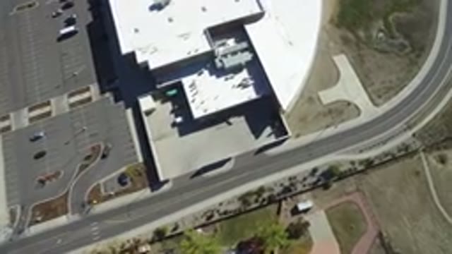 HIDDEN LAKE COLORADO-2016: Aerial View Of A Road Going Near A Company With Large