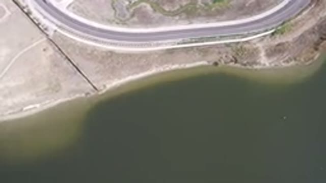 HIDDEN LAKE COLORADO-2016: The Looping Highway Beside the Olive Colored Lake