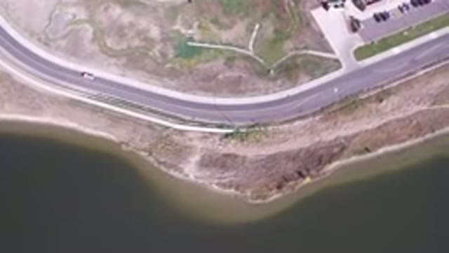 HIDDEN LAKE COLORADO-2016: An Aerial Footage Taken From A Drone Showing A Cliffside Highway And Scenic Landscape