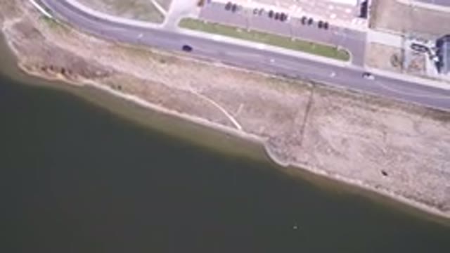 HIDDEN LAKE COLORADO-2016: Cars Driving Down A Highway Going Past A