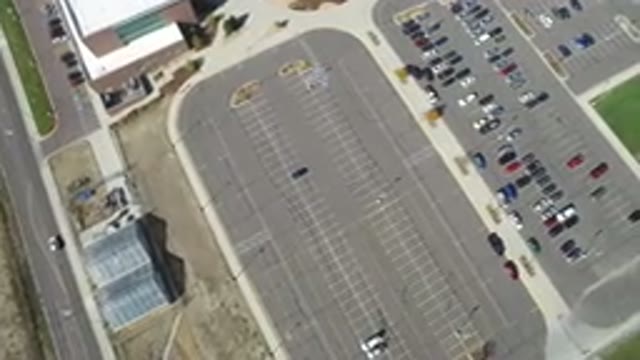 HIDDEN LAKE COLORADO-2016: Aerial Drone Footage Of A Parking Lot With Cars Near
