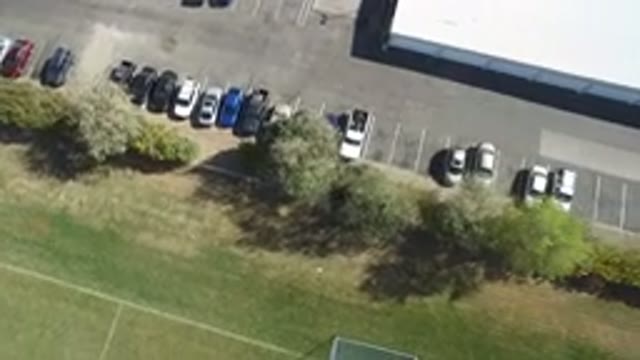 HIDDEN LAKE COLORADO-2016: A Few Cars Parked In The Back Parking Lot Of A