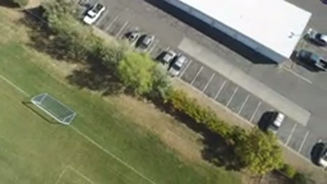 HIDDEN LAKE COLORADO-2016: Aerial View Of A Parking Lot Adjacent To A Football Field