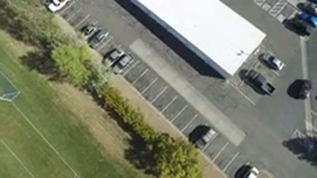 HIDDEN LAKE COLORADO-2016: Top View Of A Parking With Some Parked Cars And A