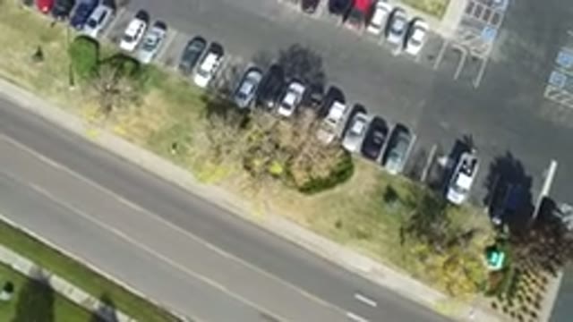 HIDDEN LAKE COLORADO-2016: Aerial View Of A Parking Lot Full Of Cars With Some