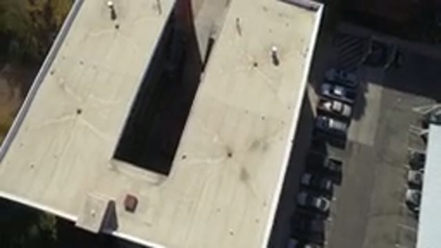 HIDDEN LAKE COLORADO-2016: Building Sky View Top Cars Roof U Shaped Apartments