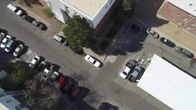 HIDDEN LAKE COLORADO-2016: Top View Of Several Buildings With Car Parking On The