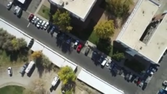 HIDDEN LAKE COLORADO-2016: A Top View Of Buildings And Cars Packed In A Residential Area