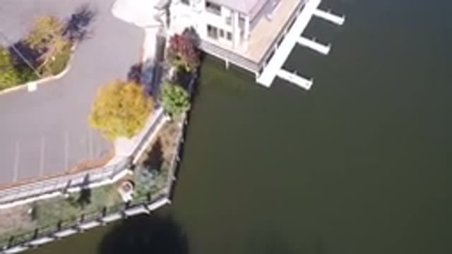 HIDDEN LAKE COLORADO-2016: A Building Extended Into The Water Of The Lake Nearby