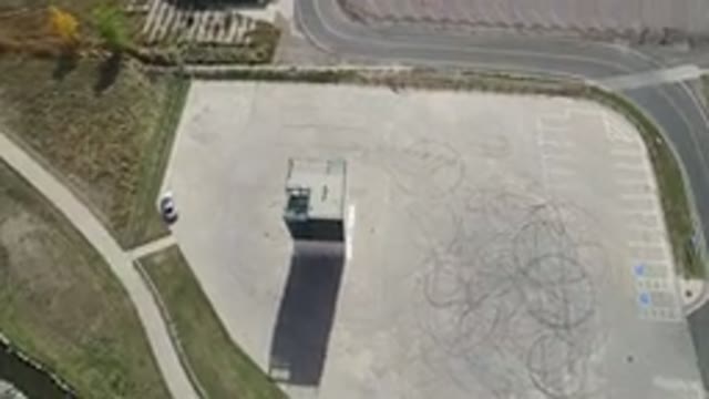 HIDDEN LAKE COLORADO-2016: Tower Building In The Middle Of A Paved Area Between